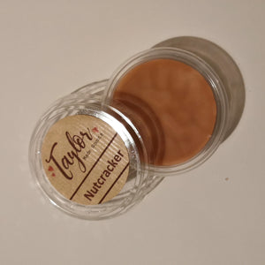 wax melt scent shot in nutcracker fragrance. brown in colour 